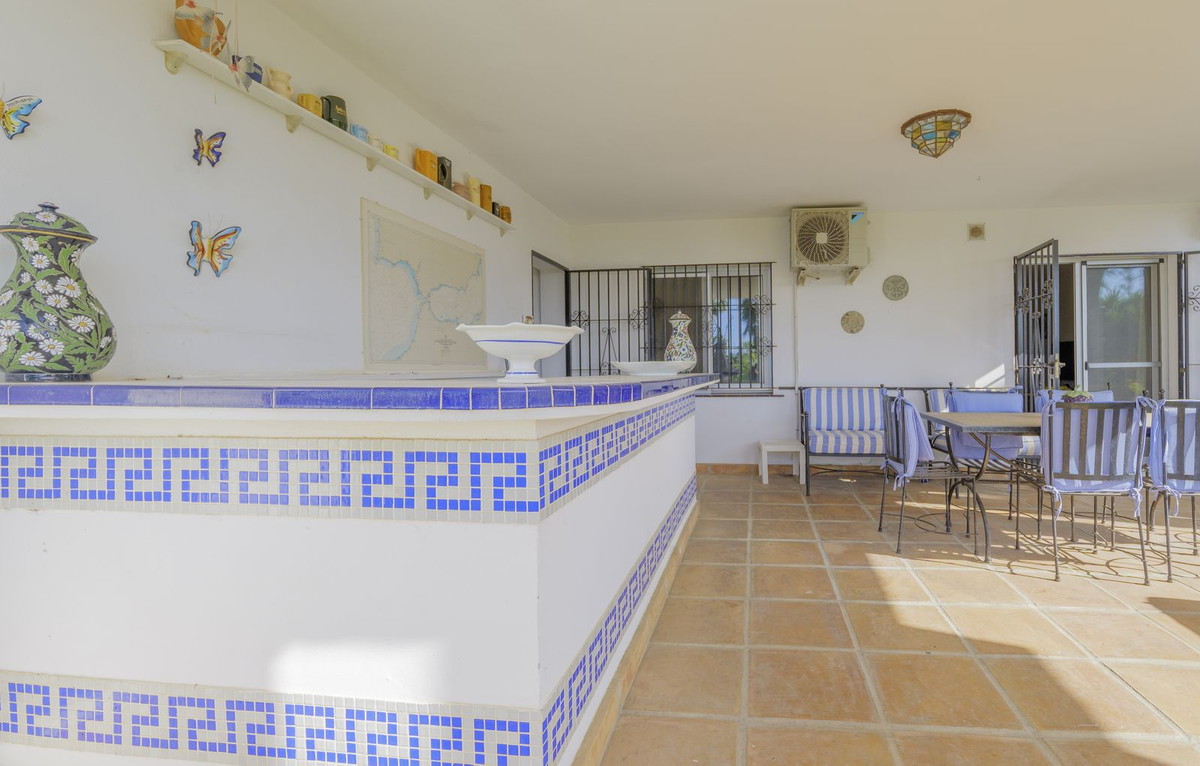 Sea view detached Villa in Elviria with three apartments with their own private access.